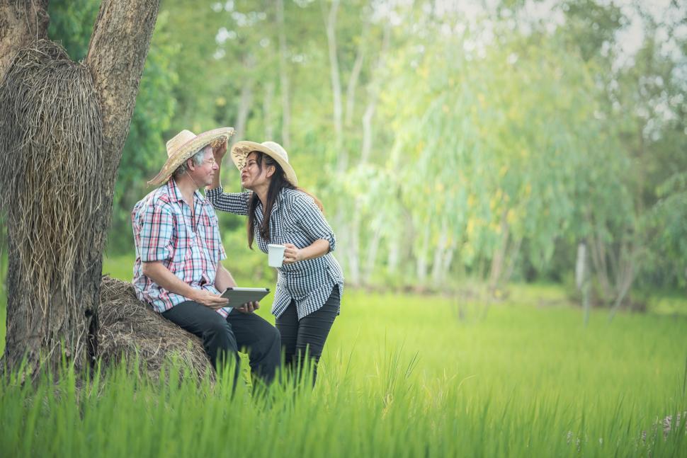Free Image of Couple Sitting in Grass 