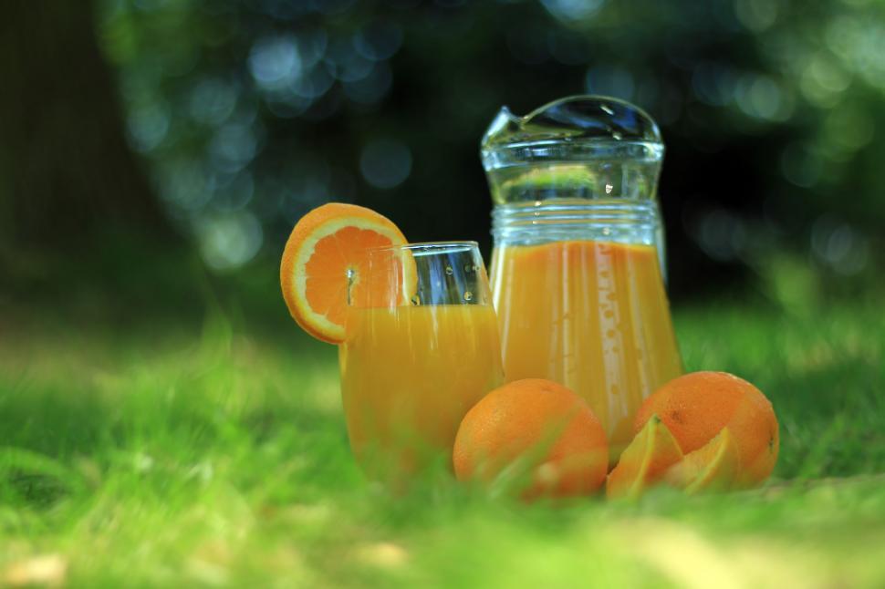 Free Image of Fresh Orange Juice and Oranges on Table 