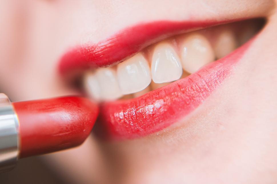 Free Image of Person Applying Lipstick on Lips 
