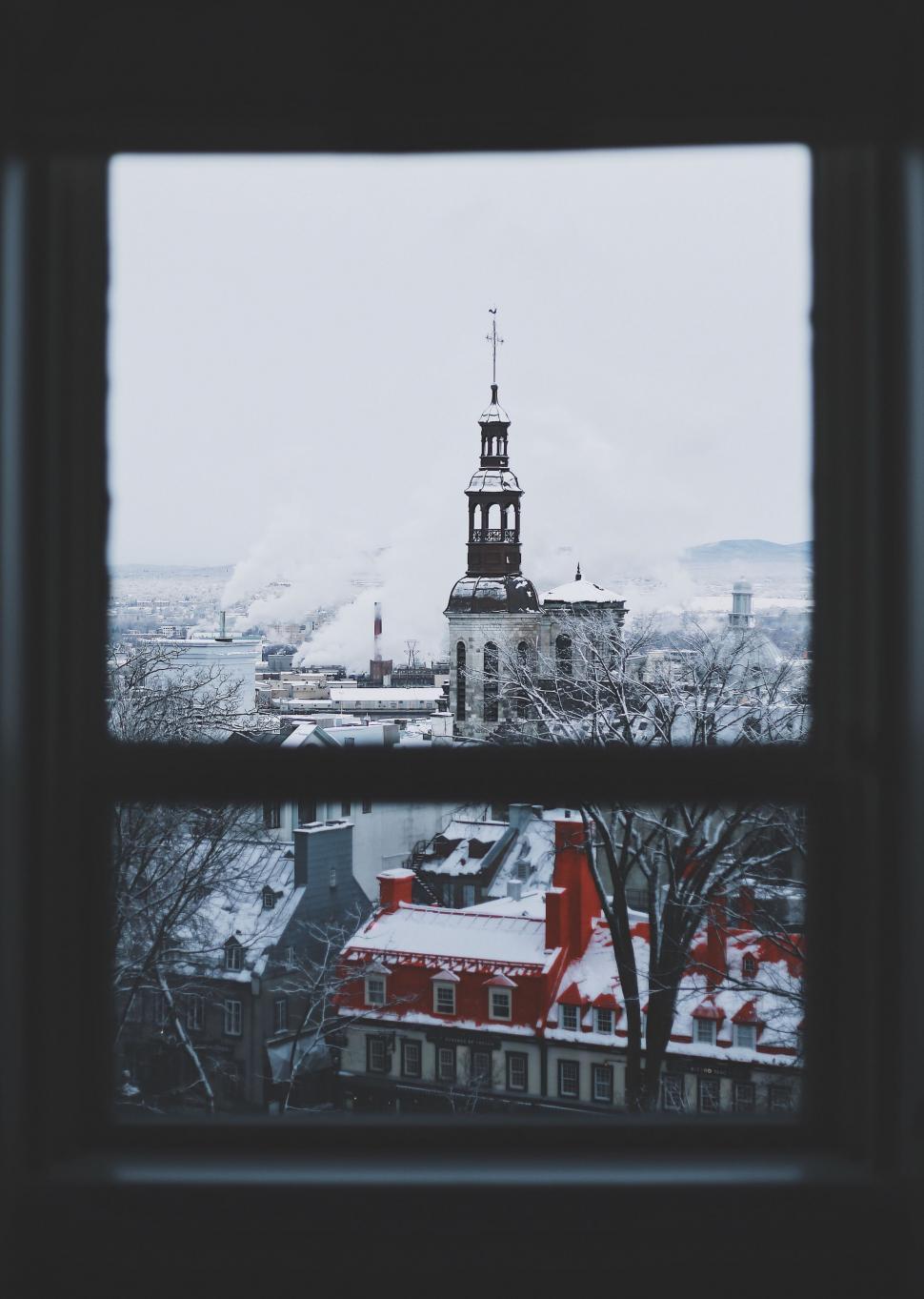Free Image of Cityscape Through a Window 