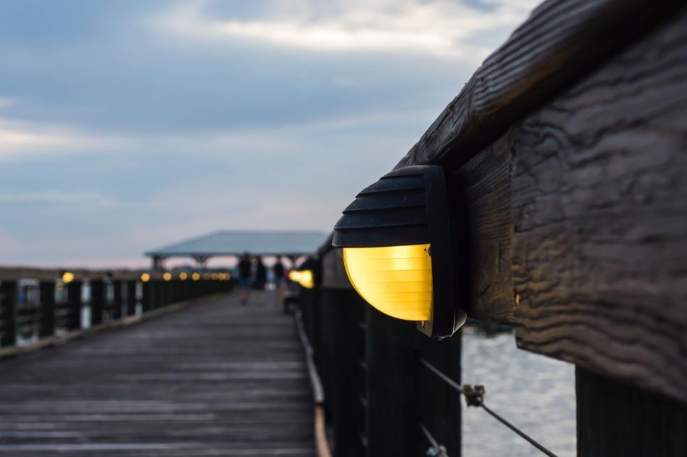 Free Image of Wooden Dock With Yellow Light 