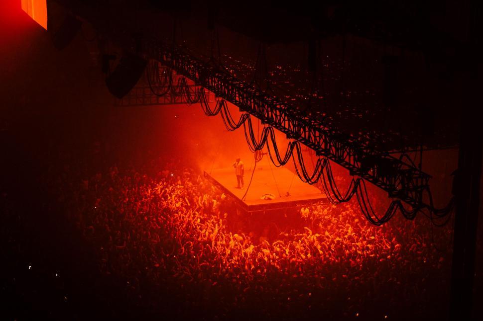 Free Image of Red Light Shining on Stage 