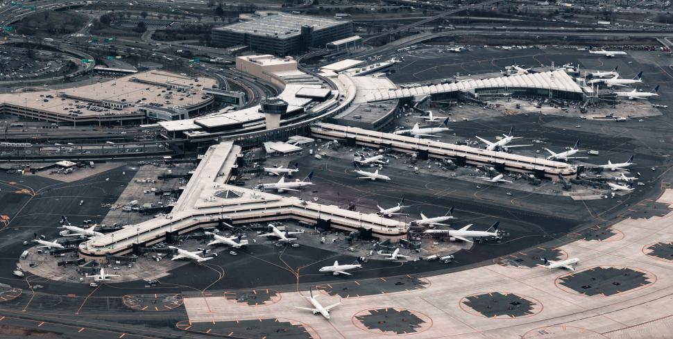 Free Image of Busy Airport Ramp With Multiple Planes 