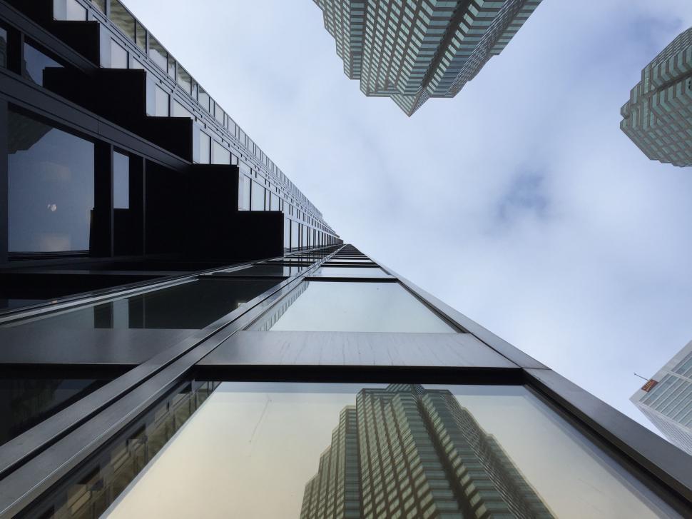 Free Image of Looking Up at Tall Buildings 