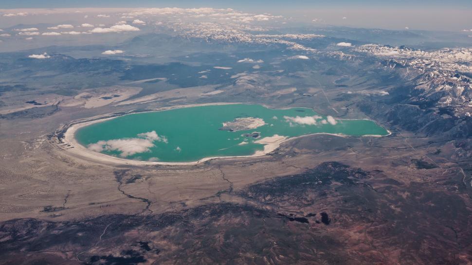 Free Image of Aerial View of Lake Surrounded by Mountains 