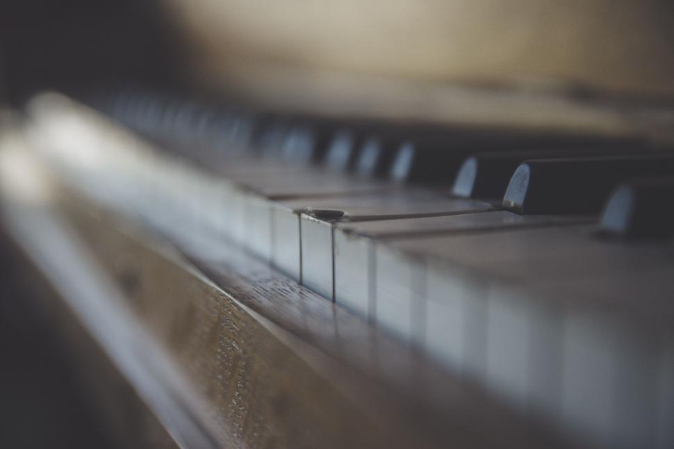 Free Image of Close Up of Piano Keyboard With Blurry Background 