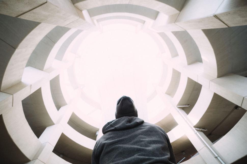 Free Image of Person Standing in the Center of Circular Structure 