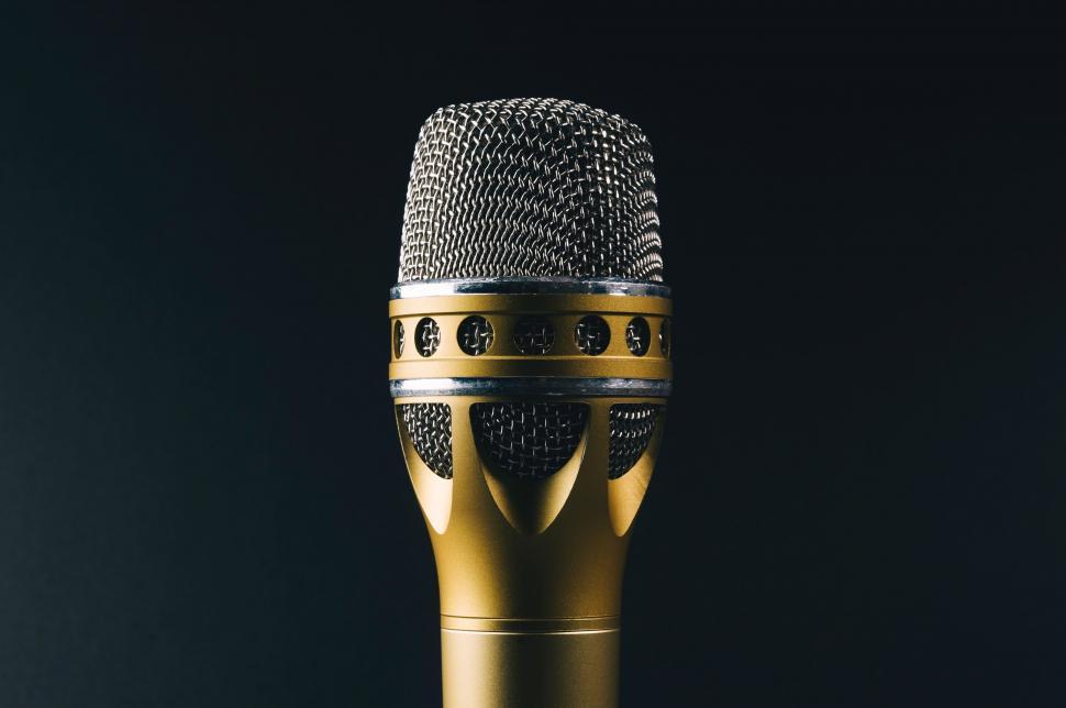 Free Image of Luxurious Gold Microphone on Black Background 