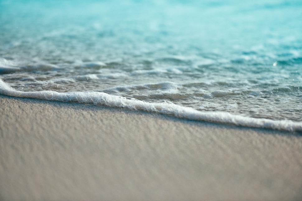 Free Image of Close Up of a Wave on a Beach 