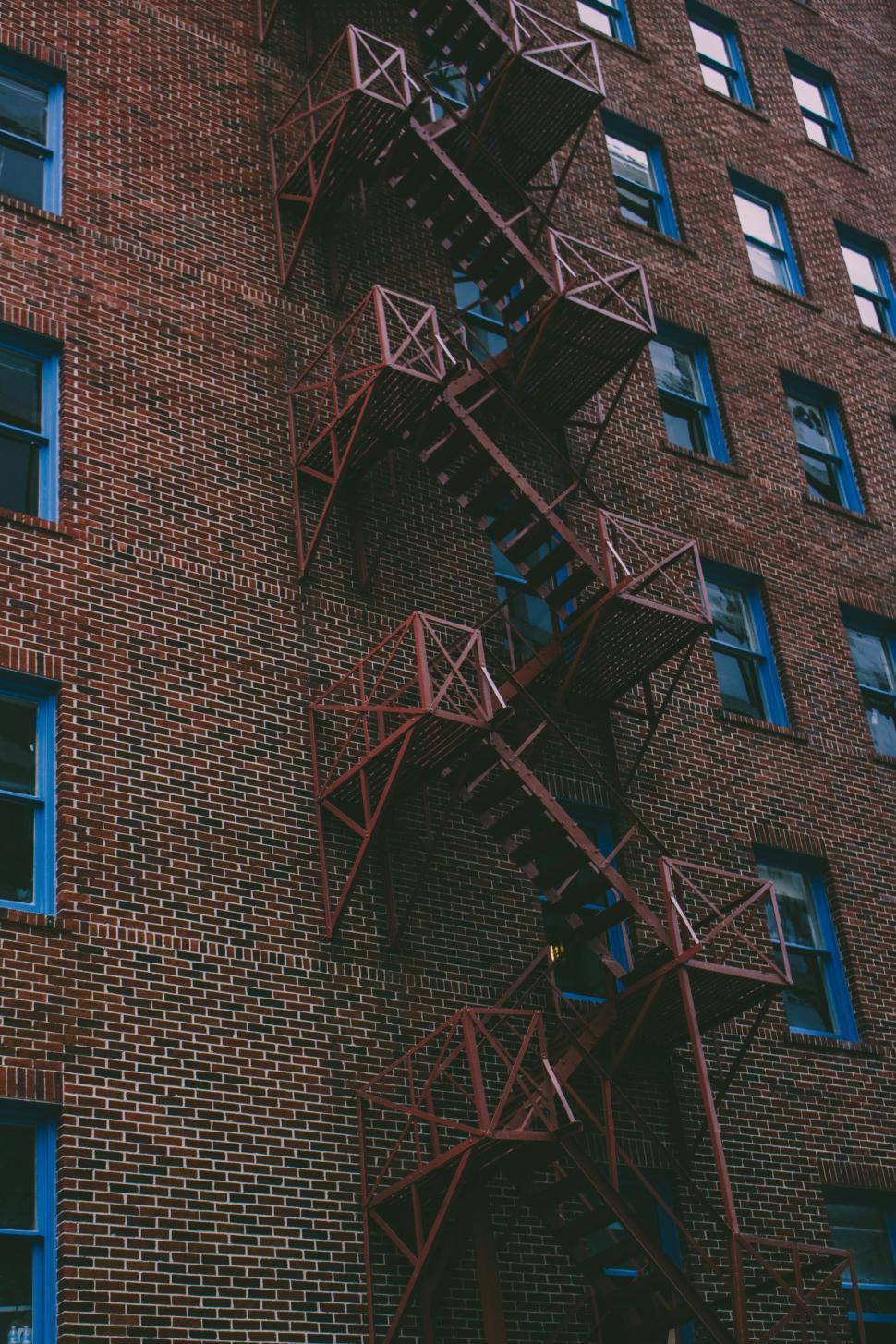 Free Image of Fire Escape on the Side of a Brick Building 