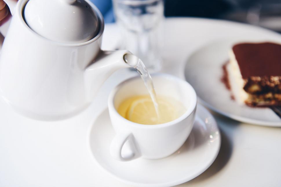Free Image of White Plate With Cake and Tea Cup 