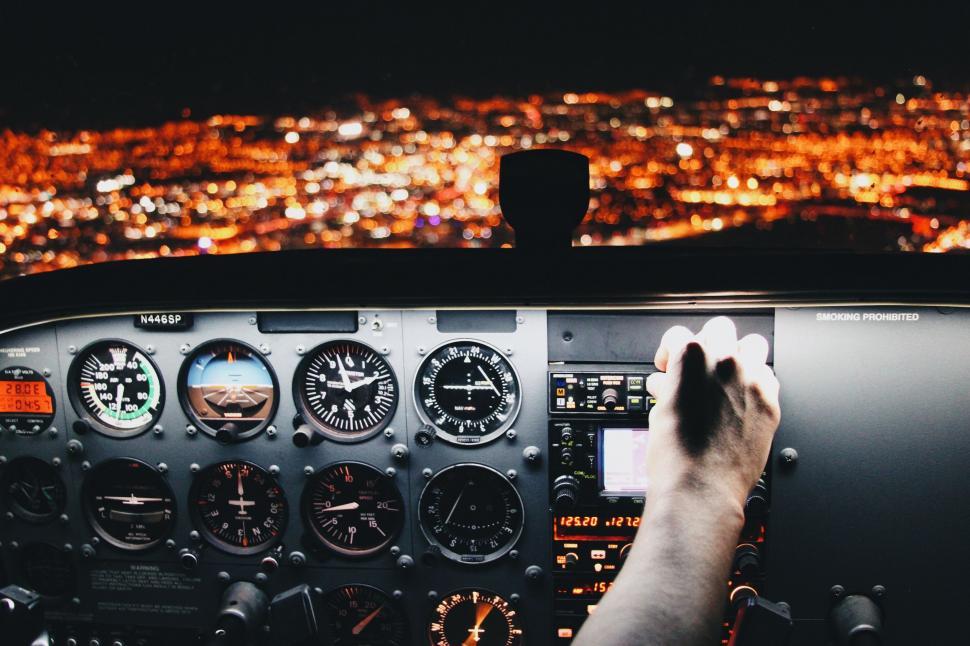 Free Image of Person Sitting in Cockpit of Airplane 