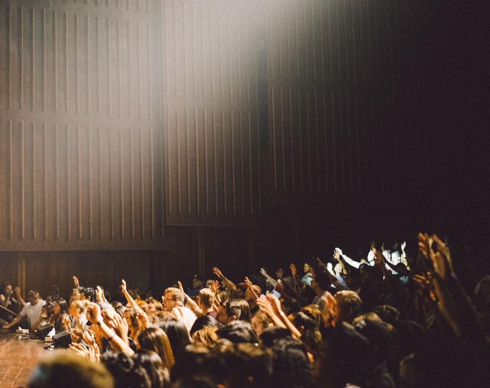 Free Image of Crowd of People Standing Around a Stage 