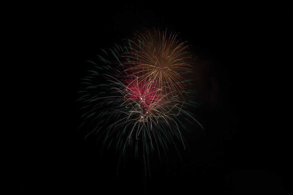Free Image of Red and White Firework Exploding in Night Sky 