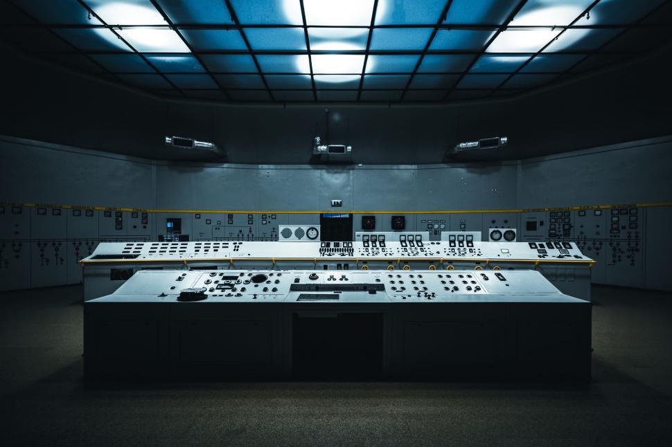 Free Image of High-Tech Control Room With Numerous Buttons and Lights 