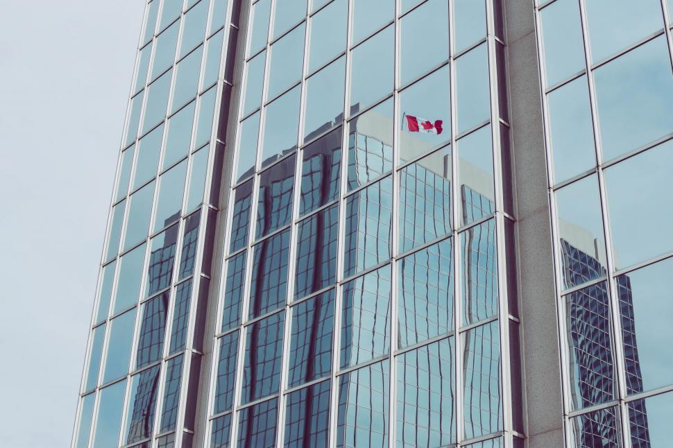 Free Image of Glass Building Featuring Canadian Flag 