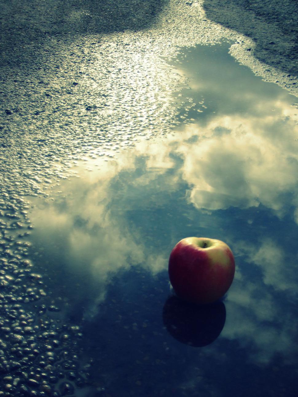 Free Image of floating apple in the clouds 