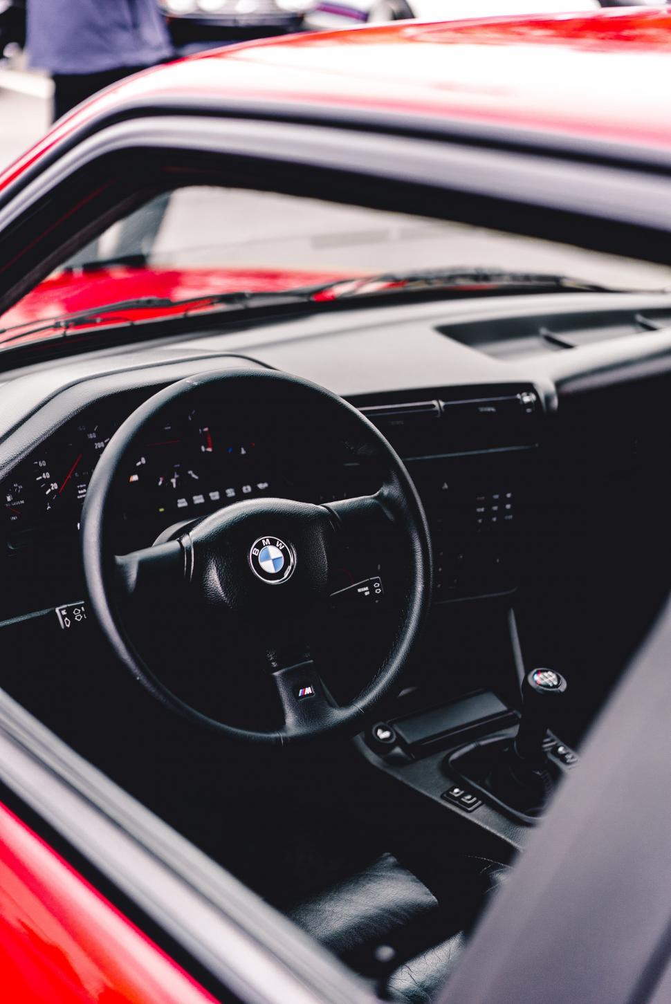 Free Image of Close Up of Car Dashboard With Steering Wheel 