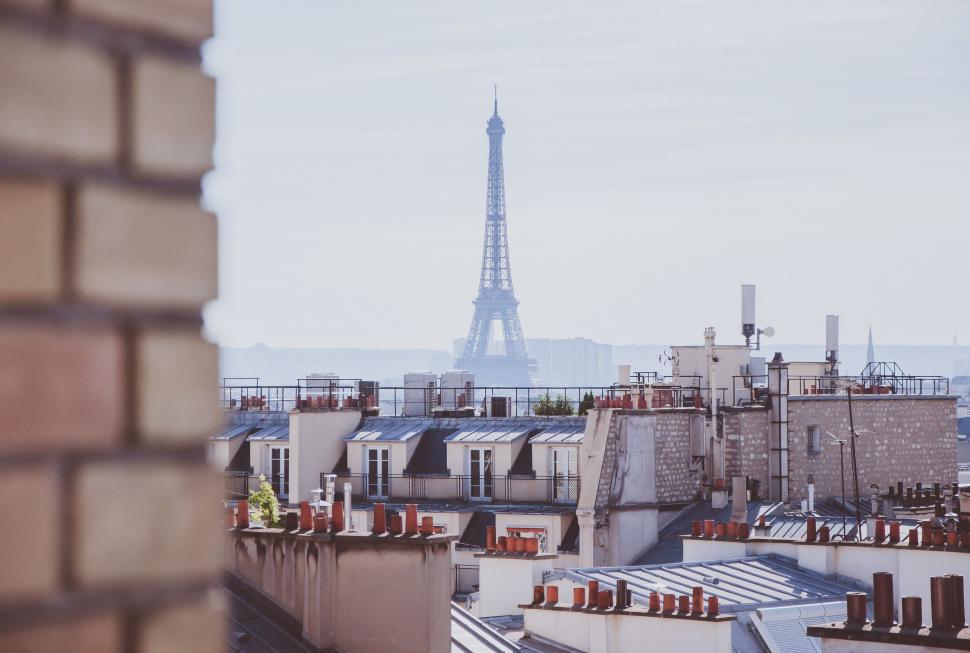 Free Image of A View of the Eiffel Tower From a Building Roof 