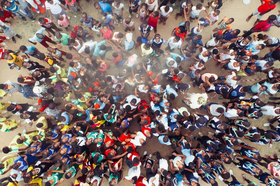 Free Image of Large Group of People Standing in a Circle 