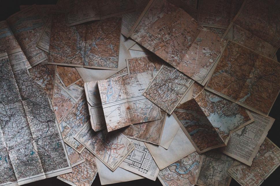 Free Image of A Pile of Old Maps 
