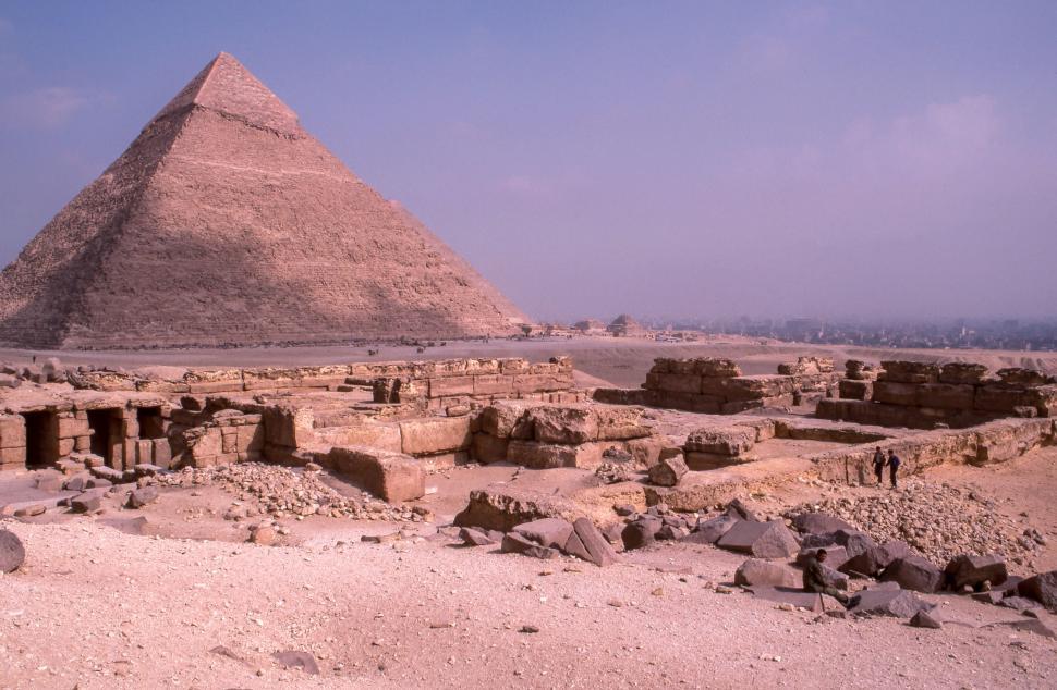 Free Image of Massive Pyramid Towering in Desolate Desert Landscape 