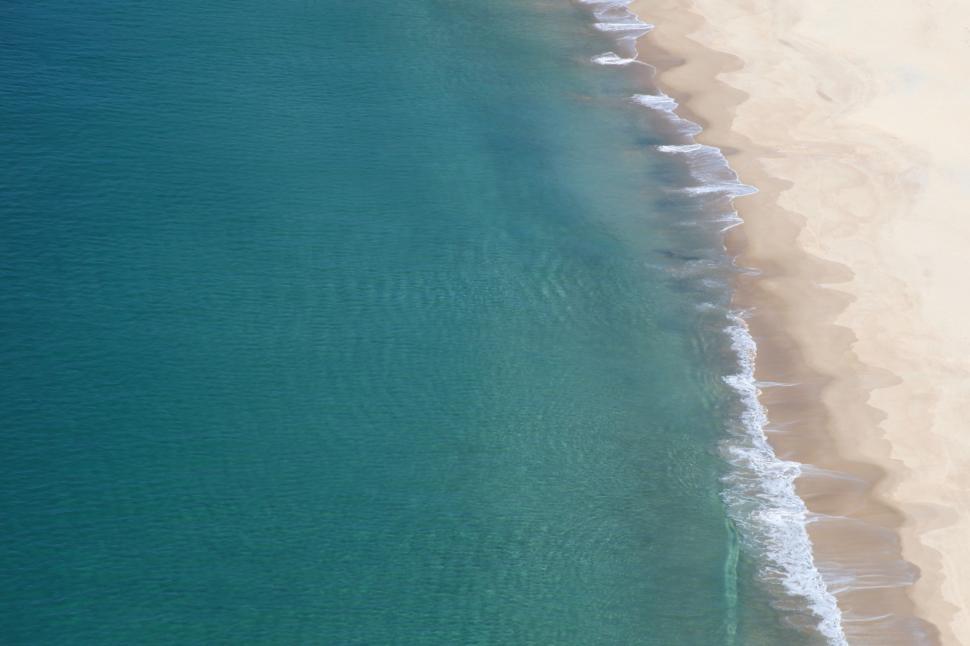 Free Image of Aerial View of Beach With Boat 