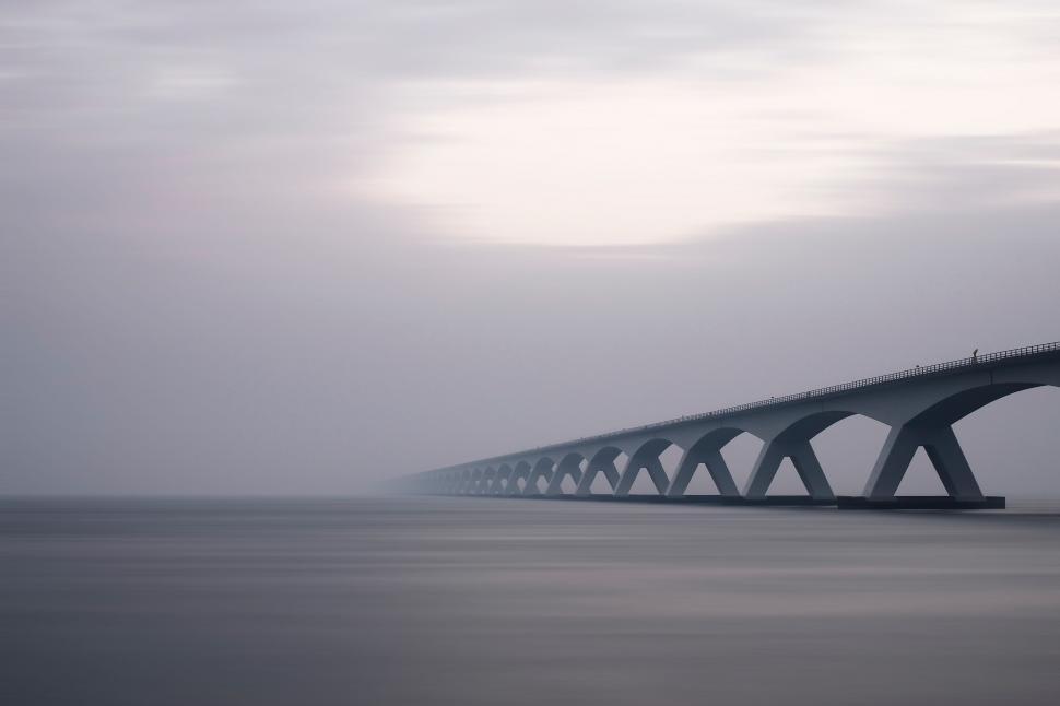 Free Image of Long Bridge Over Large Body of Water 