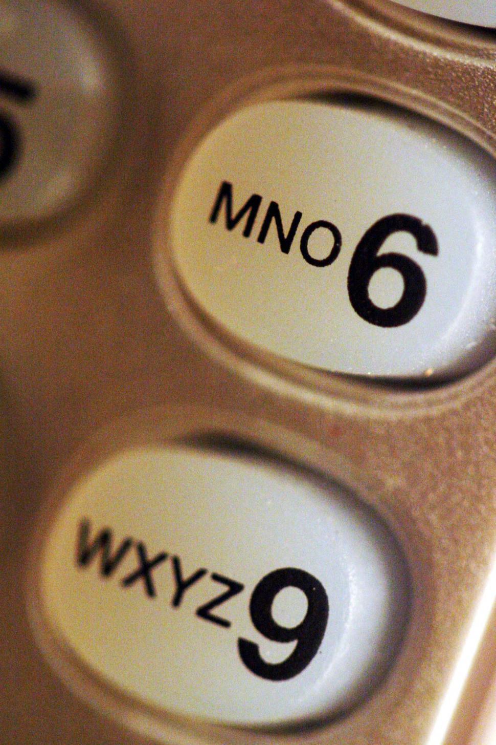 Free Image of phone telephone buttons keys keypad talk telecommunications calls numbers letters six nine wxyz mno 