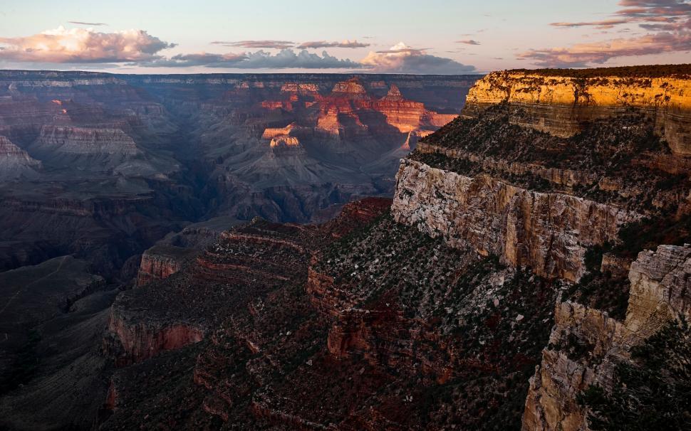 Free Image of The Sun Sets at the Edge of the Grand Canyon 