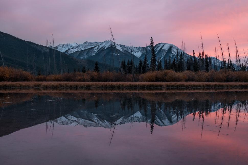 Free Image of Mountain Range Reflecting in Still Lake 