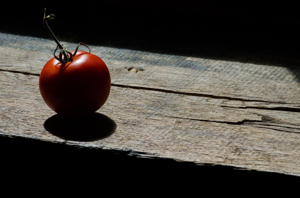Free Image of Tomato on Wooden Table 