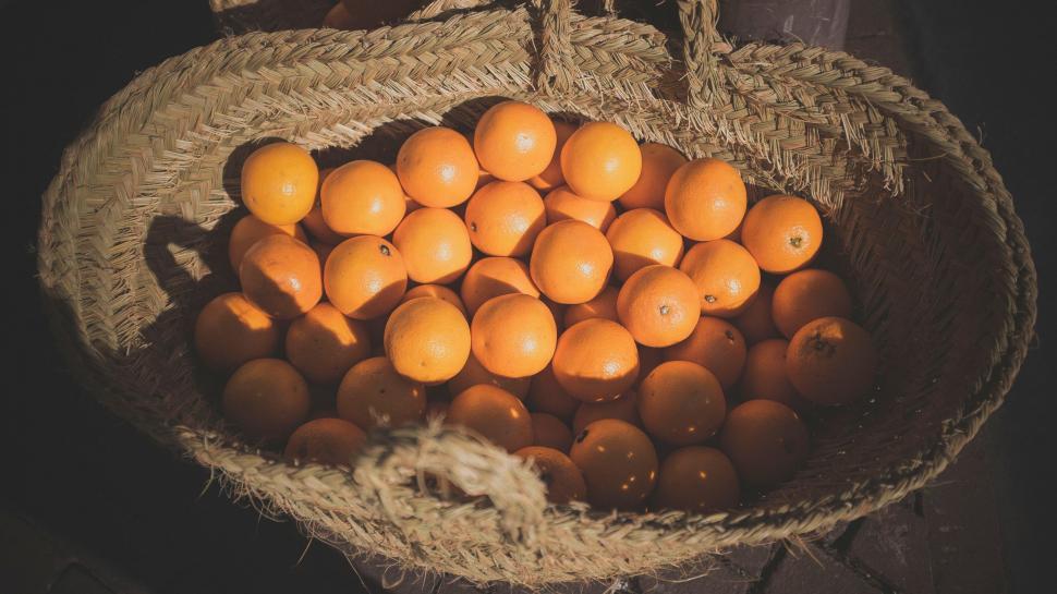 Free Image of Basket of Oranges on Table 