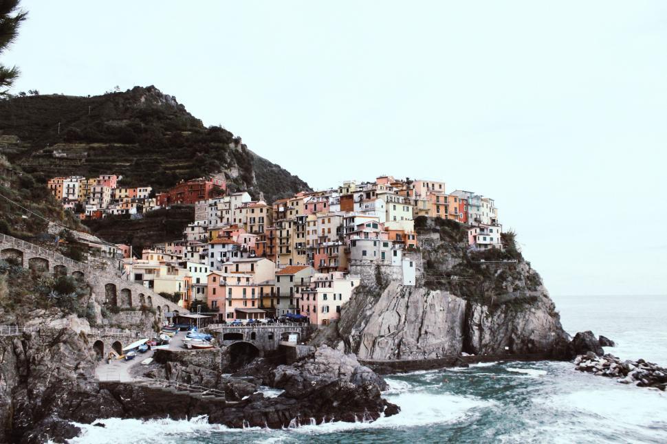 Free Image of Village on Cliff Overlooking Ocean 