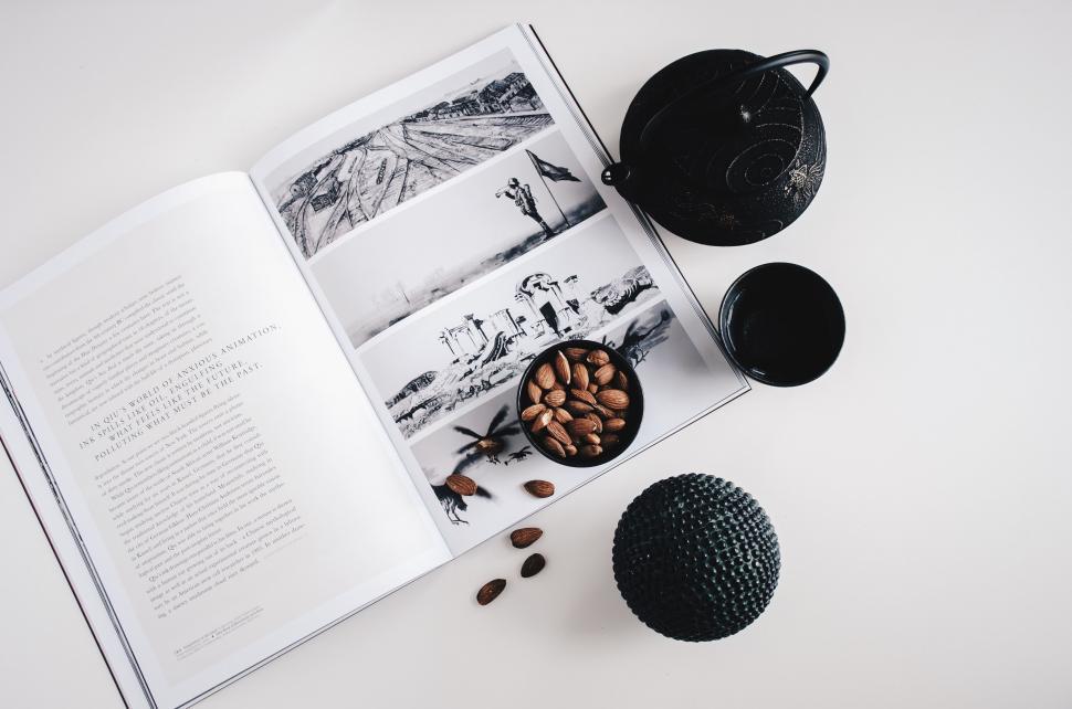 Free Image of Open Book on Table With Coffee Beans 