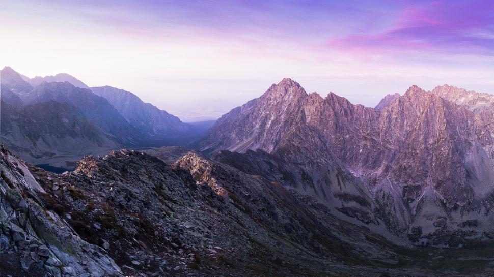 Free Image of Majestic Mountain Range Under a Purple Sky 