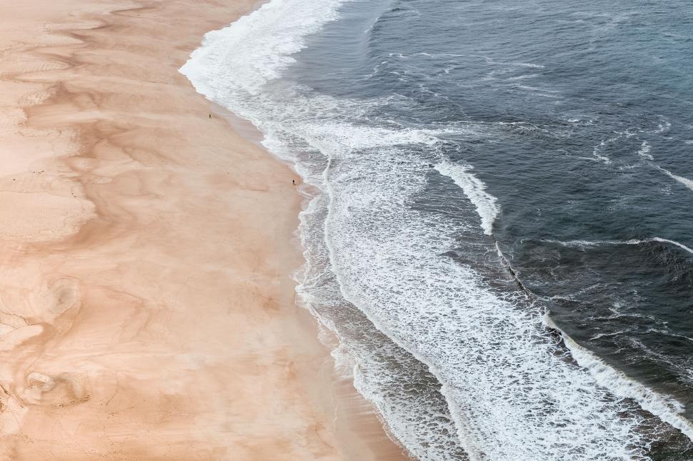 Free Image of Aerial View of Sandy Beach and Ocean 