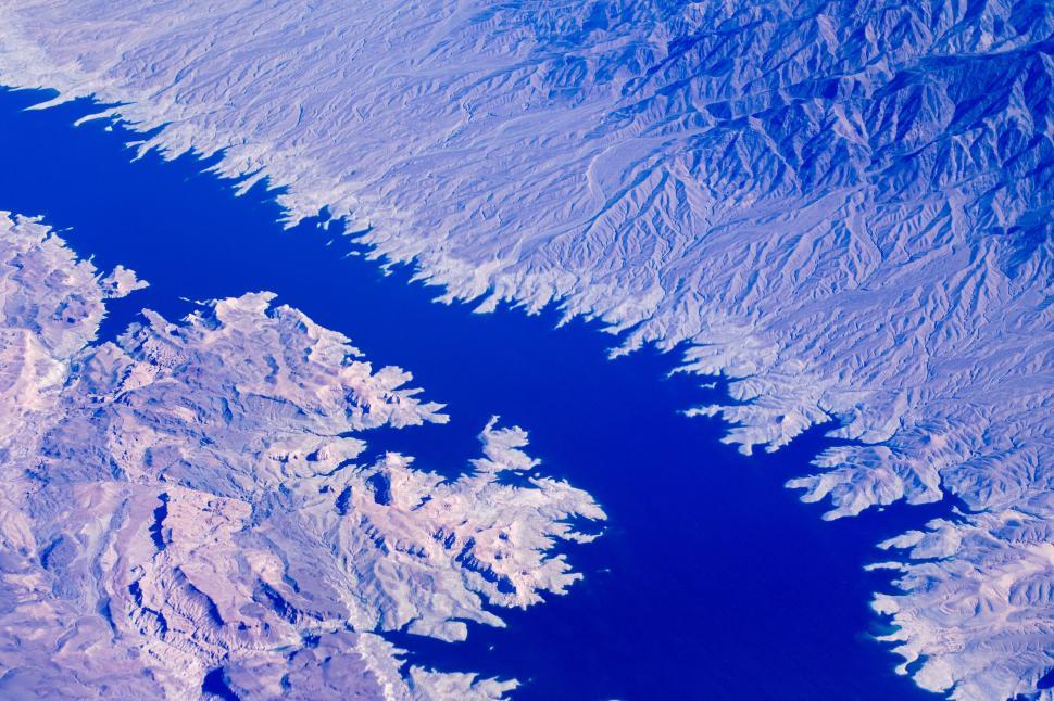 Free Image of Aerial View of a Lake Surrounded by Mountains 