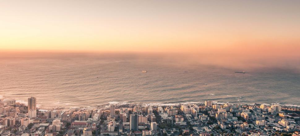 Free Image of Aerial View of City and Ocean 