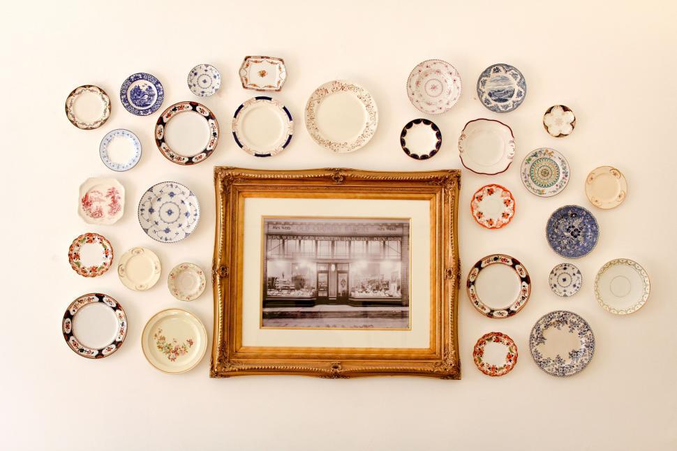 Free Image of Group of Plates Hanging on a Wall 