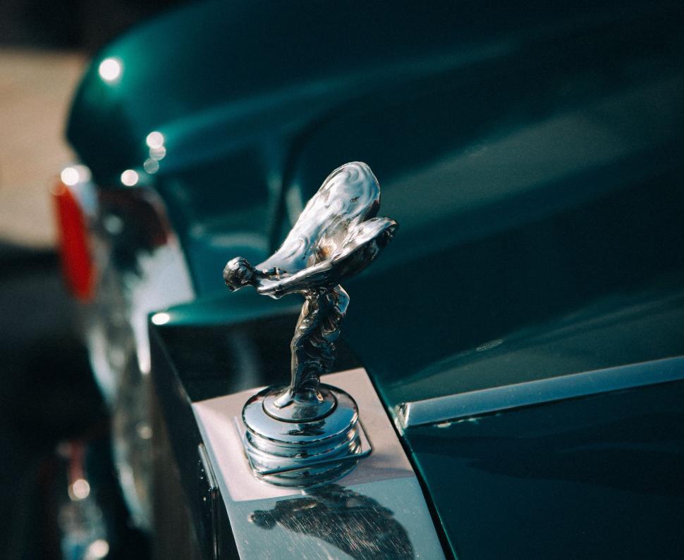 Free Image of Close Up of a Cars Hood Ornament 