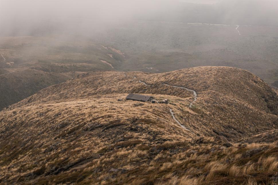 Free Image of Brown Grass Hill in Fog 