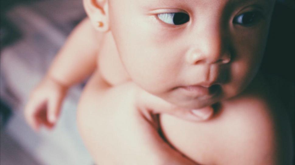 Free Image of Close Up of Baby With Blue Eyes 