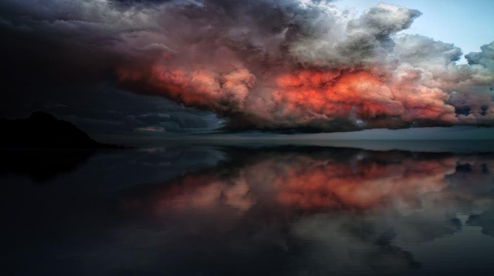 Free Image of Intriguing Red and Black Cloud Formation 