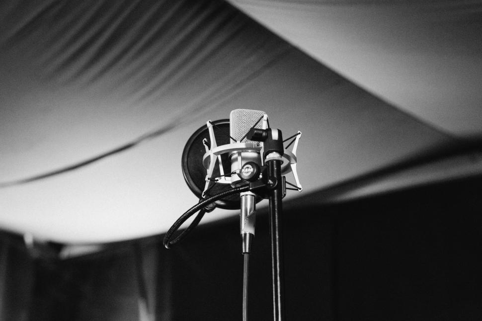 Free Image of Microphone in Front of a White Tent 