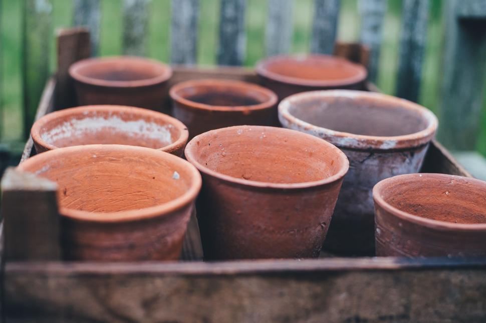 Free Image of Group of Clay Pots on Table 