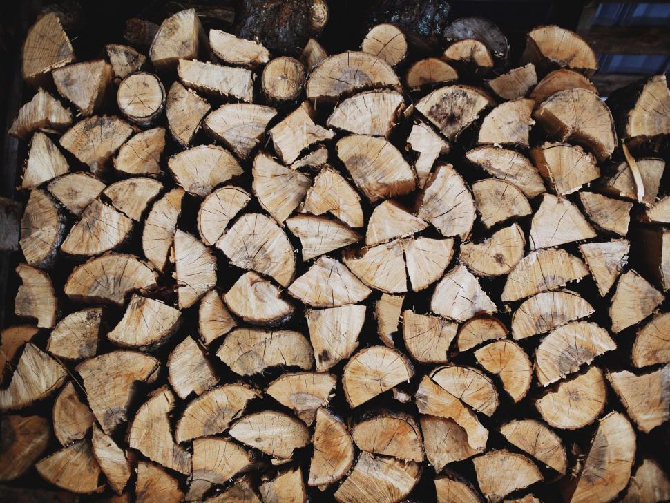 Free Image of Stack of Wood on Top of Logs 