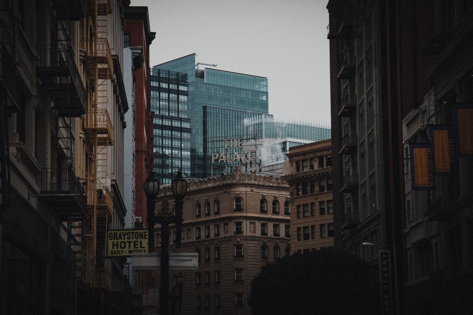 Free Image of Urban City Street With Tall Buildings 