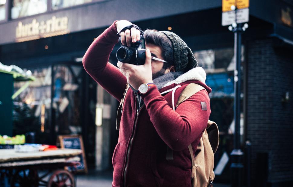 Free Image of Person Taking a Picture With a Camera 