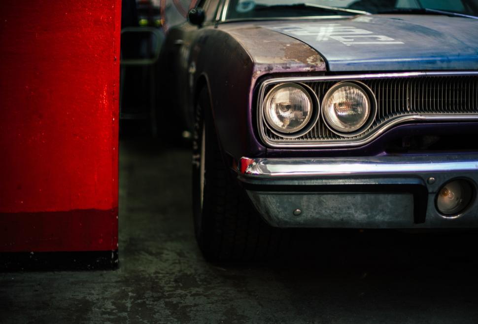 Free Image of Close Up of a Car Parked in a Garage 